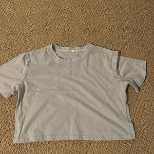 light blue cropped tee, barley worn